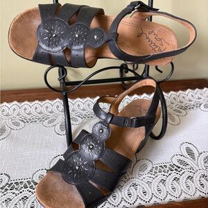 Comfortiva Black Leather Floral Cutout Ankle-Strap Sandal
